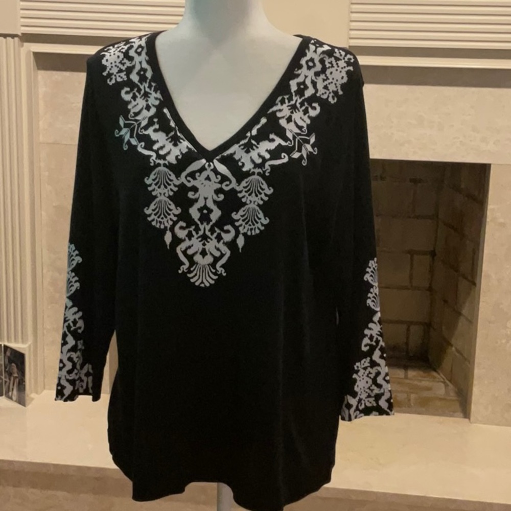 Chico's Black V-Neck Top with White Motif. 26” long. Like New Condition.
